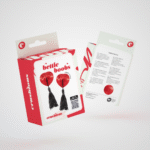 Bettie Boobs, copricapezzoli con nappine rossi e neri